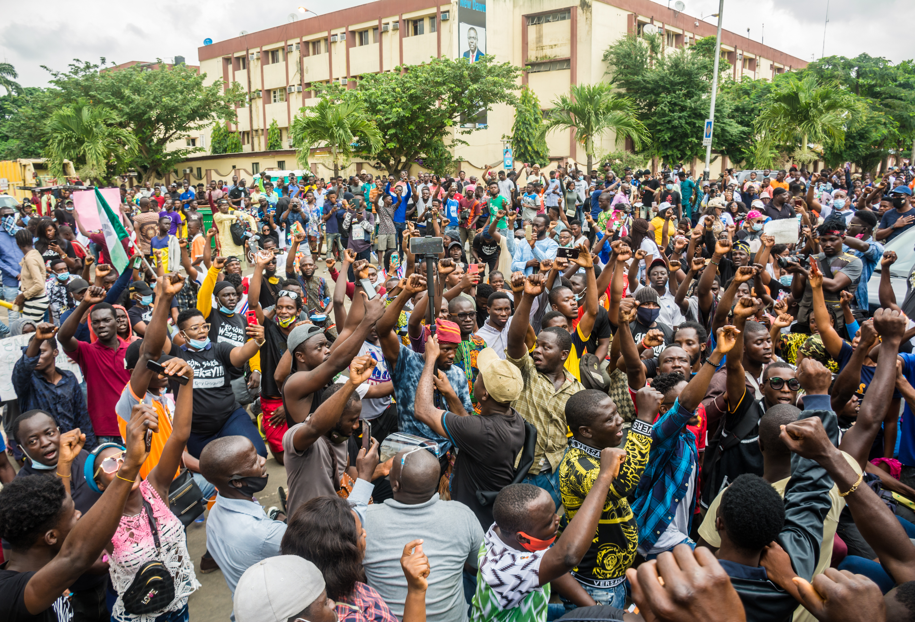image of a youth protest in Nigeria. Editorial credit: Ajibola Fasola / Shutterstock.com
